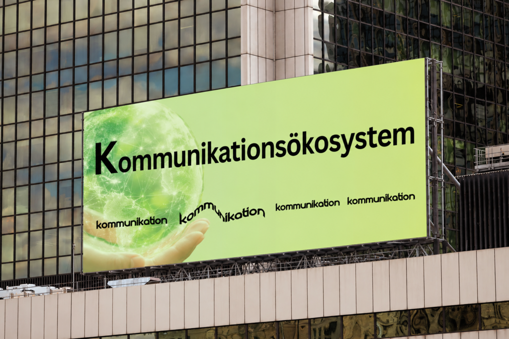 Eine Billboard-Anzeige mit der Aufschrift: Kommunikationsökosystem